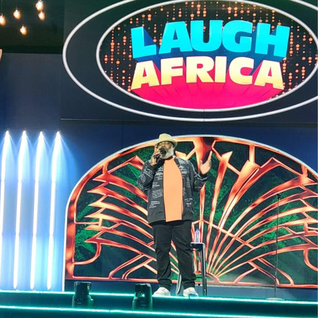 Griff perfoming on stage at Laugh Africa